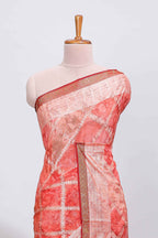 Orange checked floral theme dola silk saree with self border and matching blouse