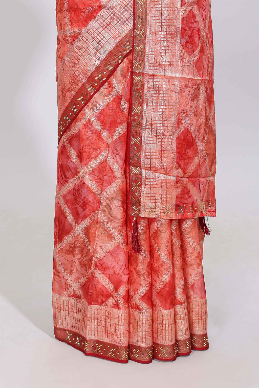 Orange checked floral theme dola silk saree with self border and matching blouse