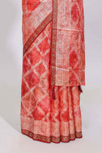 Orange checked floral theme dola silk saree with self border and matching blouse