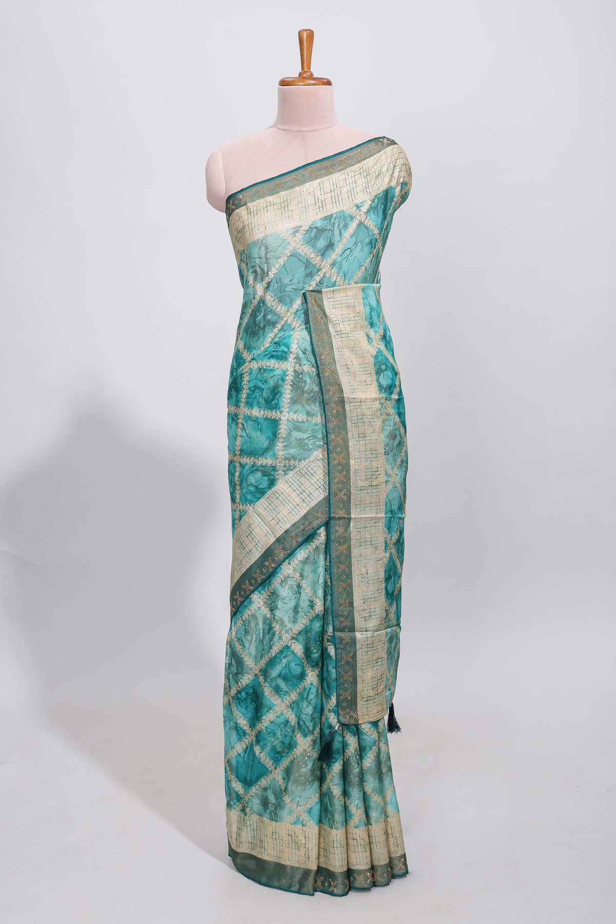 Green checked floral theme dola silk saree with self border and matching blouse
