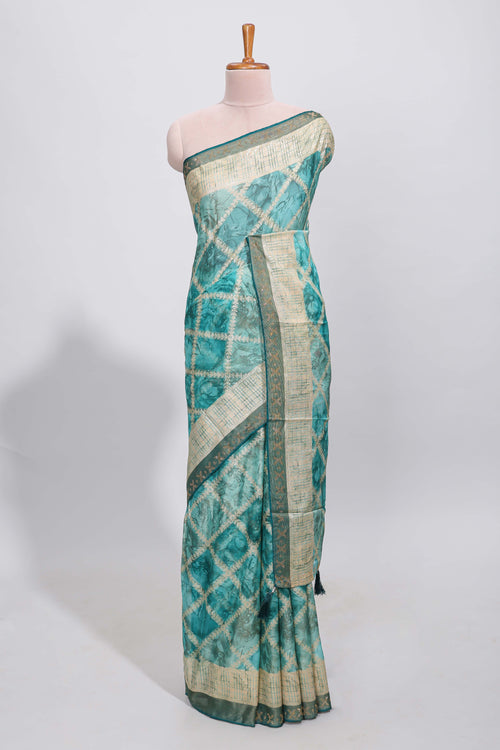Green checked floral theme dola silk saree with self border and matching blouse
