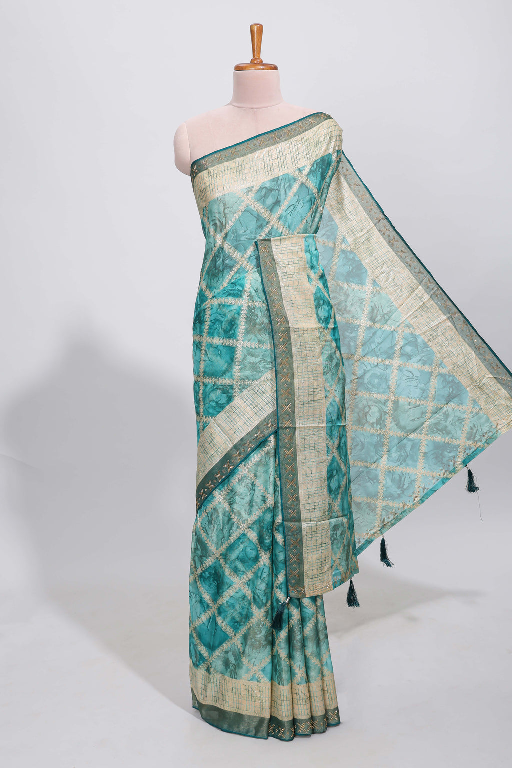 Green checked floral theme dola silk saree with self border and matching blouse