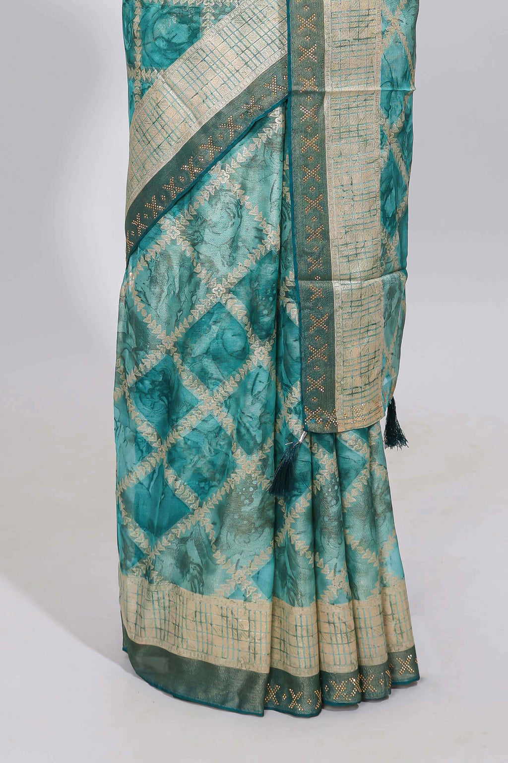 Green checked floral theme dola silk saree with self border and matching blouse