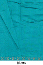 Green checked floral theme dola silk saree with self border and matching blouse