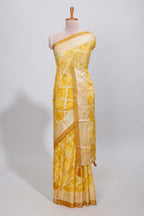 Yellow checked floral theme dola silk saree with self border and matching blouse