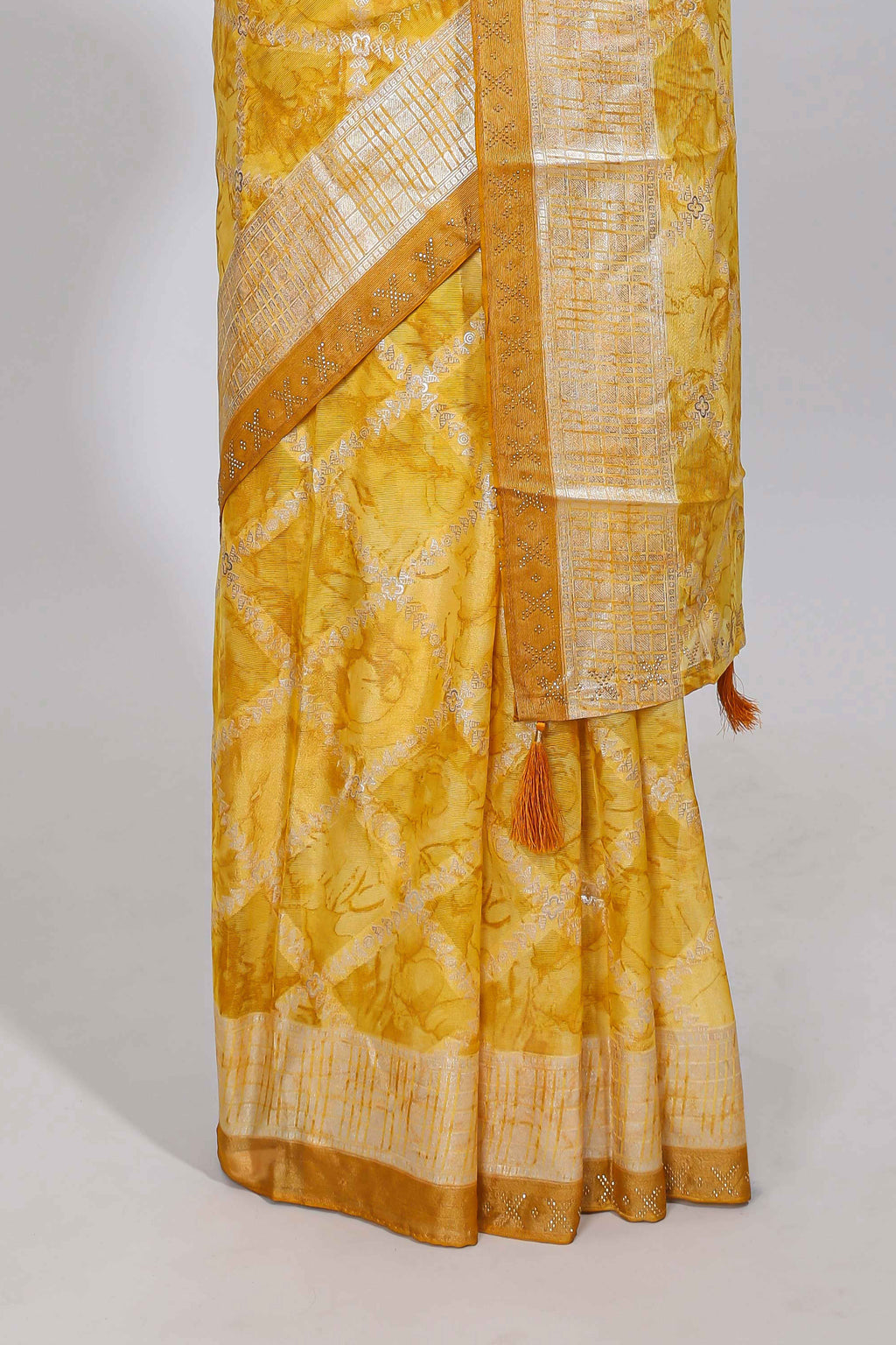 Yellow checked floral theme dola silk saree with self border and matching blouse