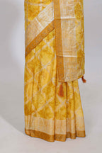 Yellow checked floral theme dola silk saree with self border and matching blouse