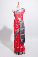 Red floral design motifs dola silk saree with contrast zari border and blouse