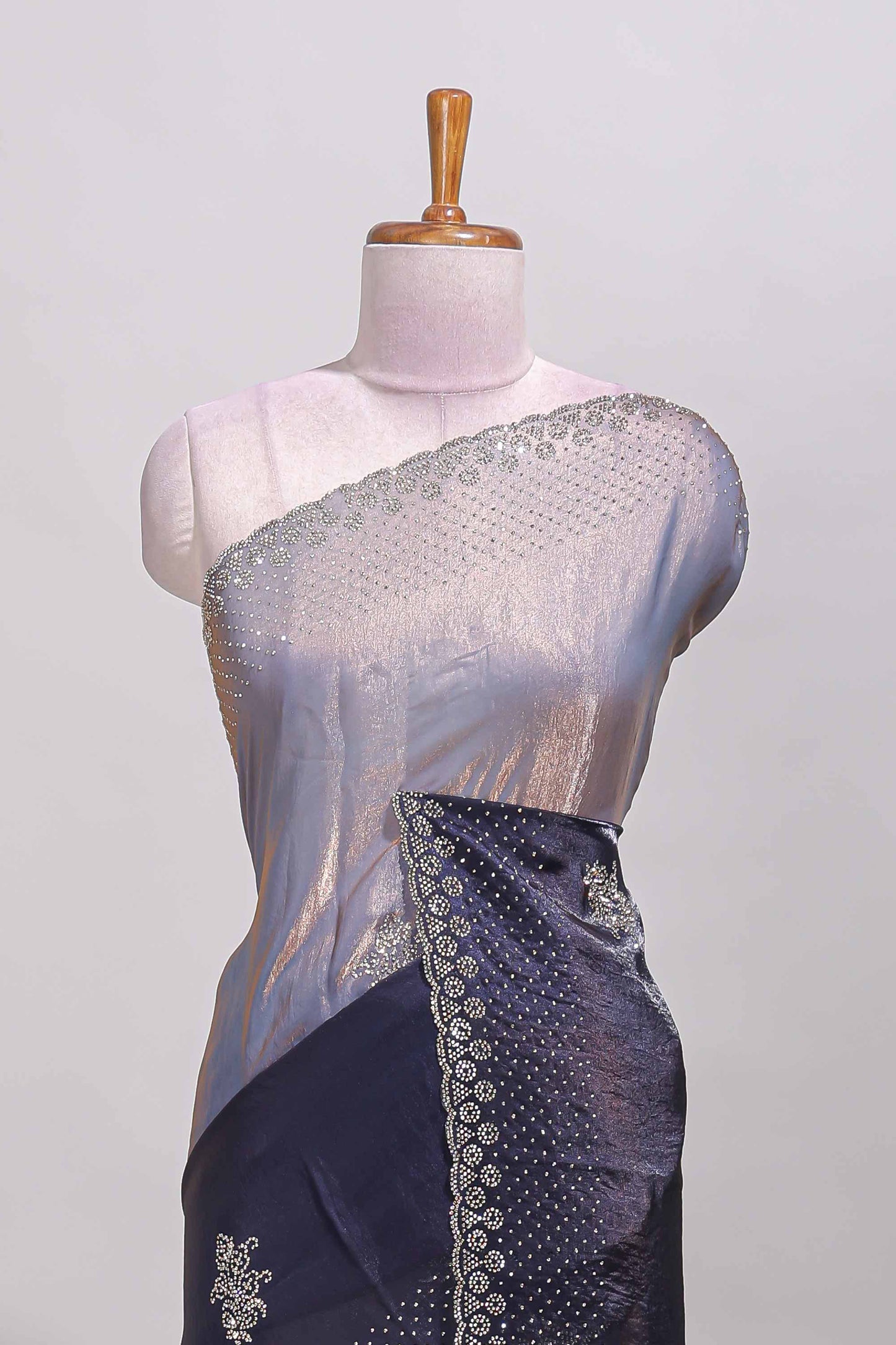 Dual tone navy blue & silver designer saree with floral motifs, stone work & scallop border