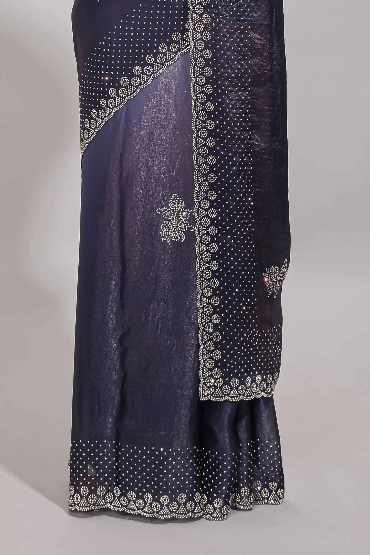 Dual tone navy blue & silver designer saree with floral motifs, stone work & scallop border