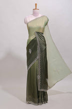 Green dual shade designer saree with floral motifs, stone work & scallop border
