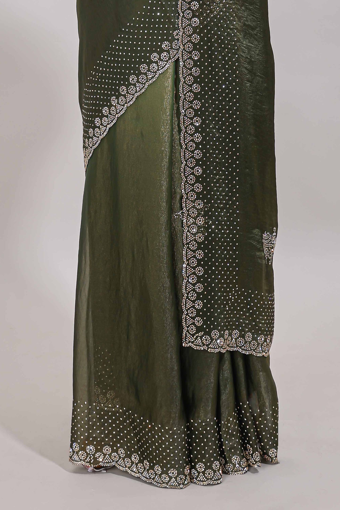 Green dual shade designer saree with floral motifs, stone work & scallop border