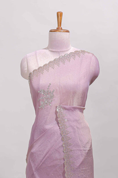 Lavender designer saree with floral motifs, stone work & scallop border
