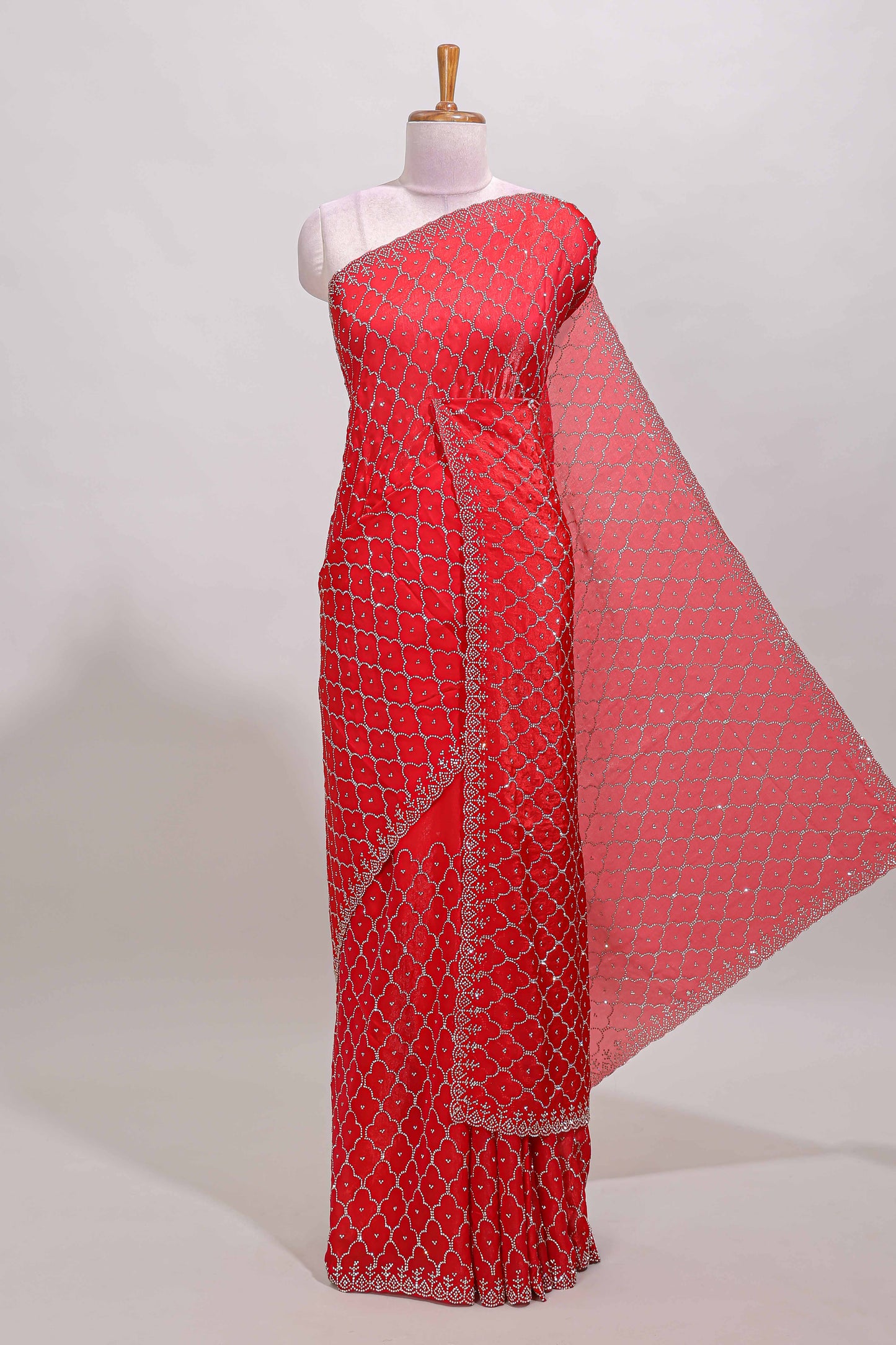 Pink geometric stone work designer saree with self scallop border and matching blouse