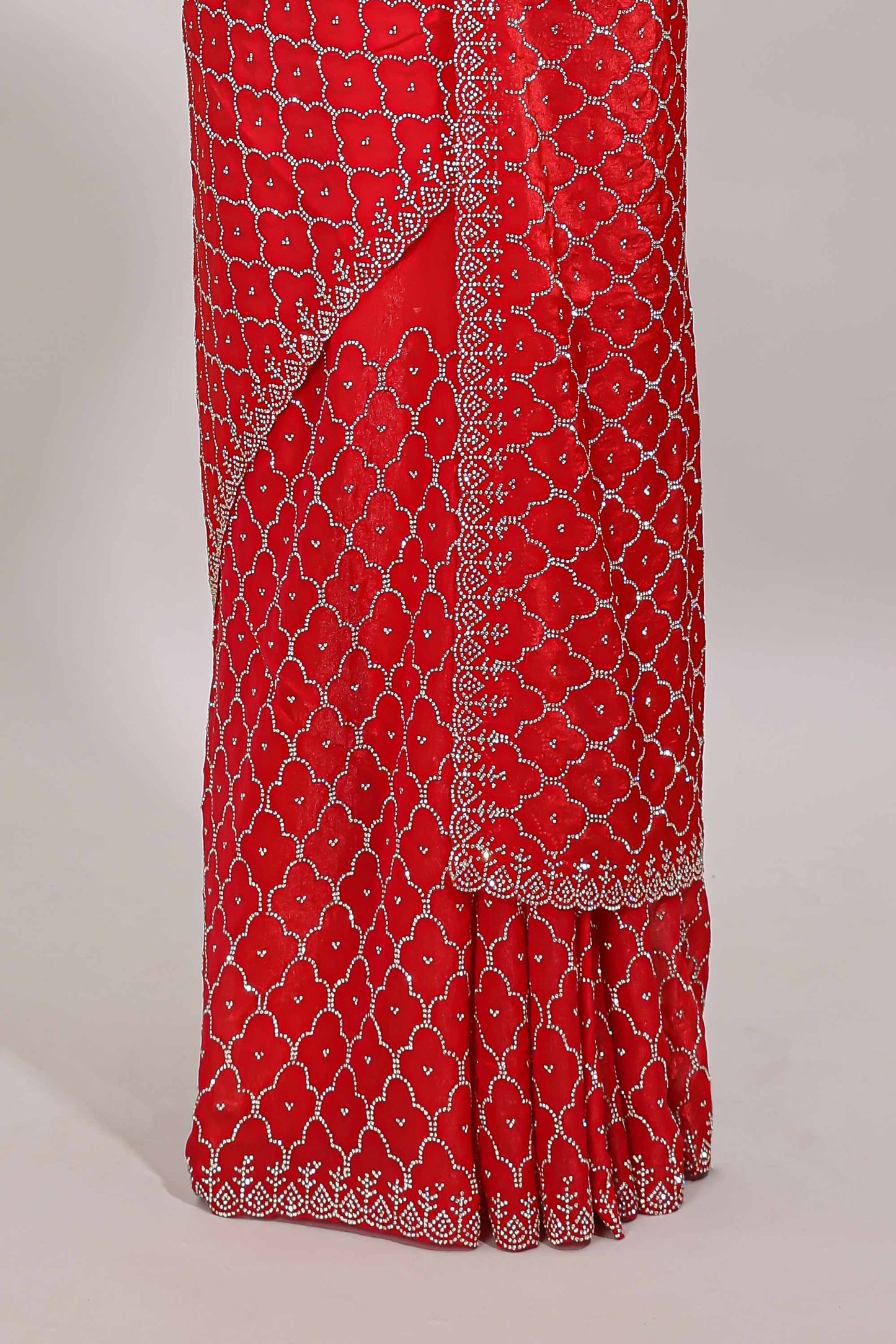 Pink geometric stone work designer saree with self scallop border and matching blouse