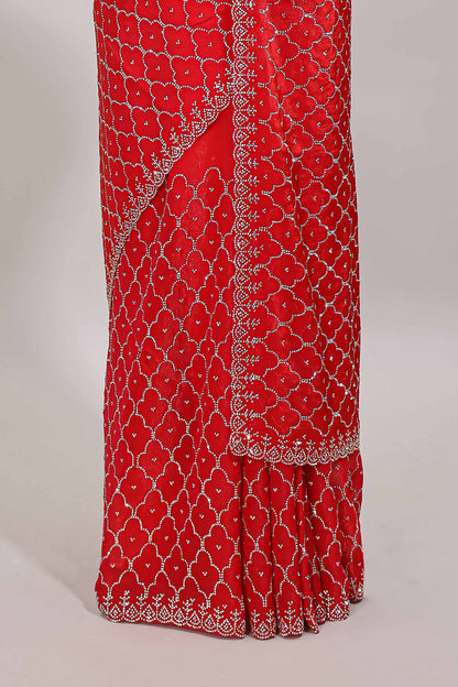 Pink geometric stone work designer saree with self scallop border and matching blouse