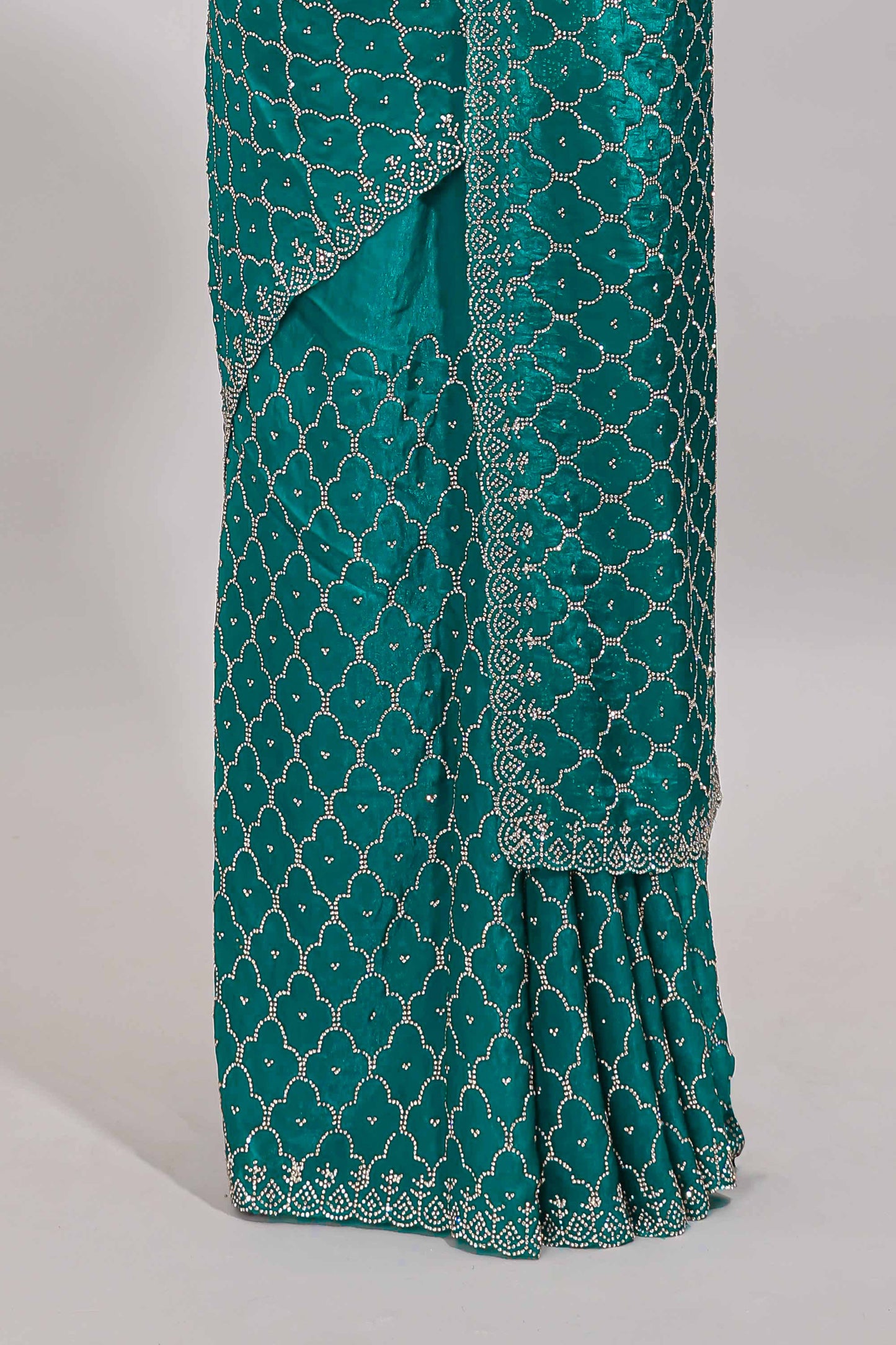 Green geometric stone work designer saree with self scallop border and matching blouse