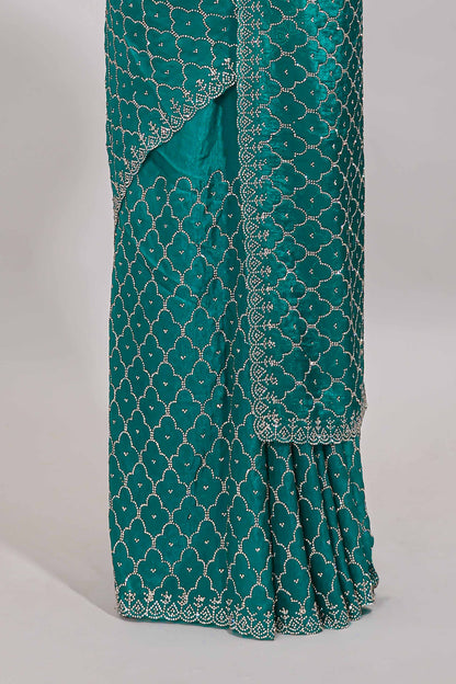Green geometric stone work designer saree with self scallop border and matching blouse