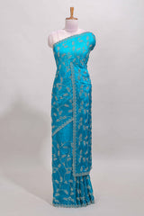 Blue floral vine stone work designer saree with self scallop border and matching blouse