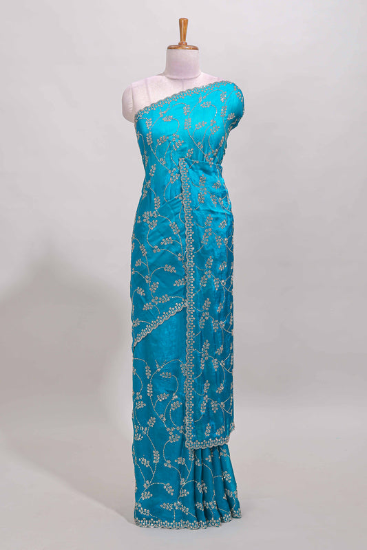Blue floral vine stone work designer saree with self scallop border and matching blouse
