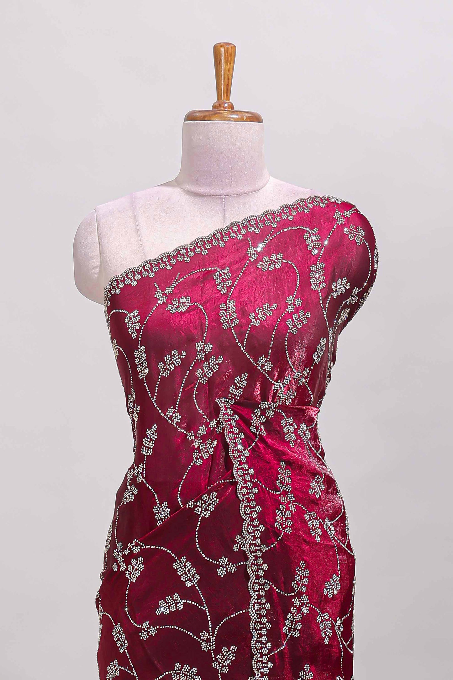 Maroon floral vine stone work designer saree with self scallop border and matching blouse