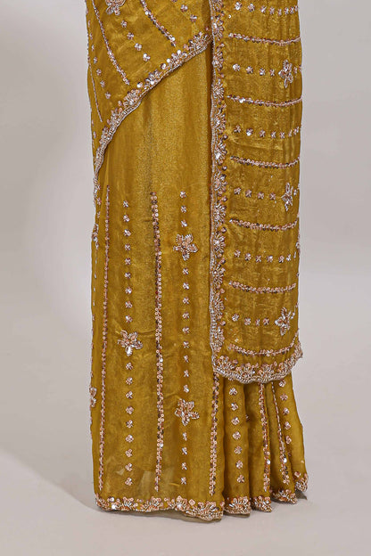 Mustard floral design chamki work designer saree with self scallop border and matching blouse