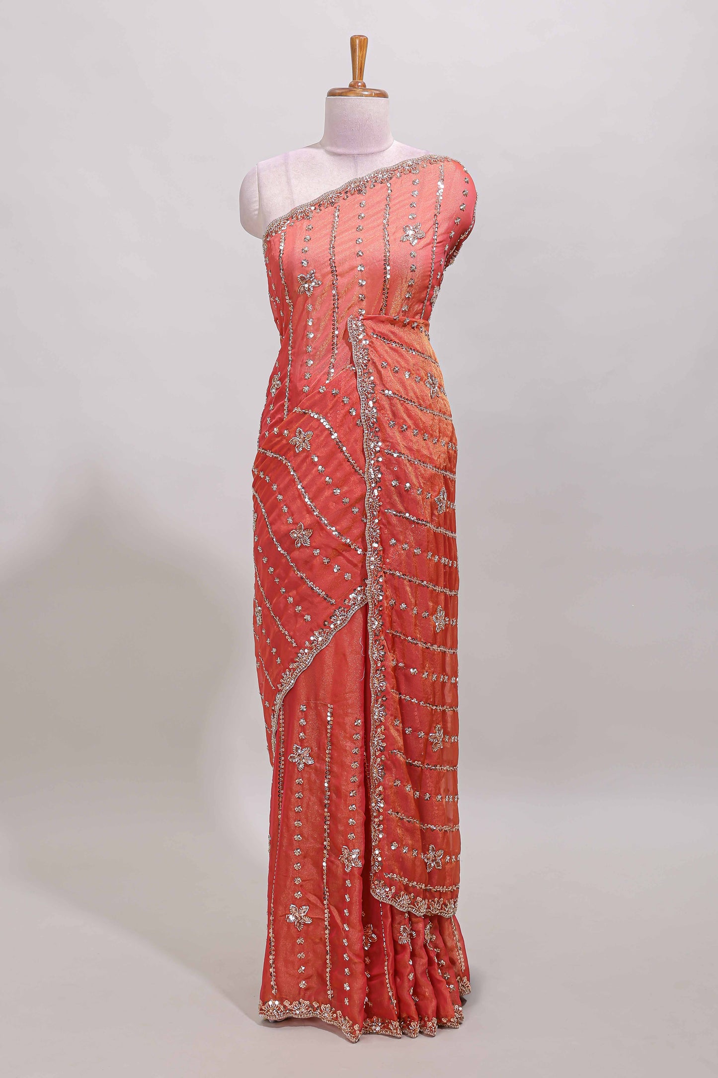 Peach floral design chamki work designer saree with self scallop border and matching blouse