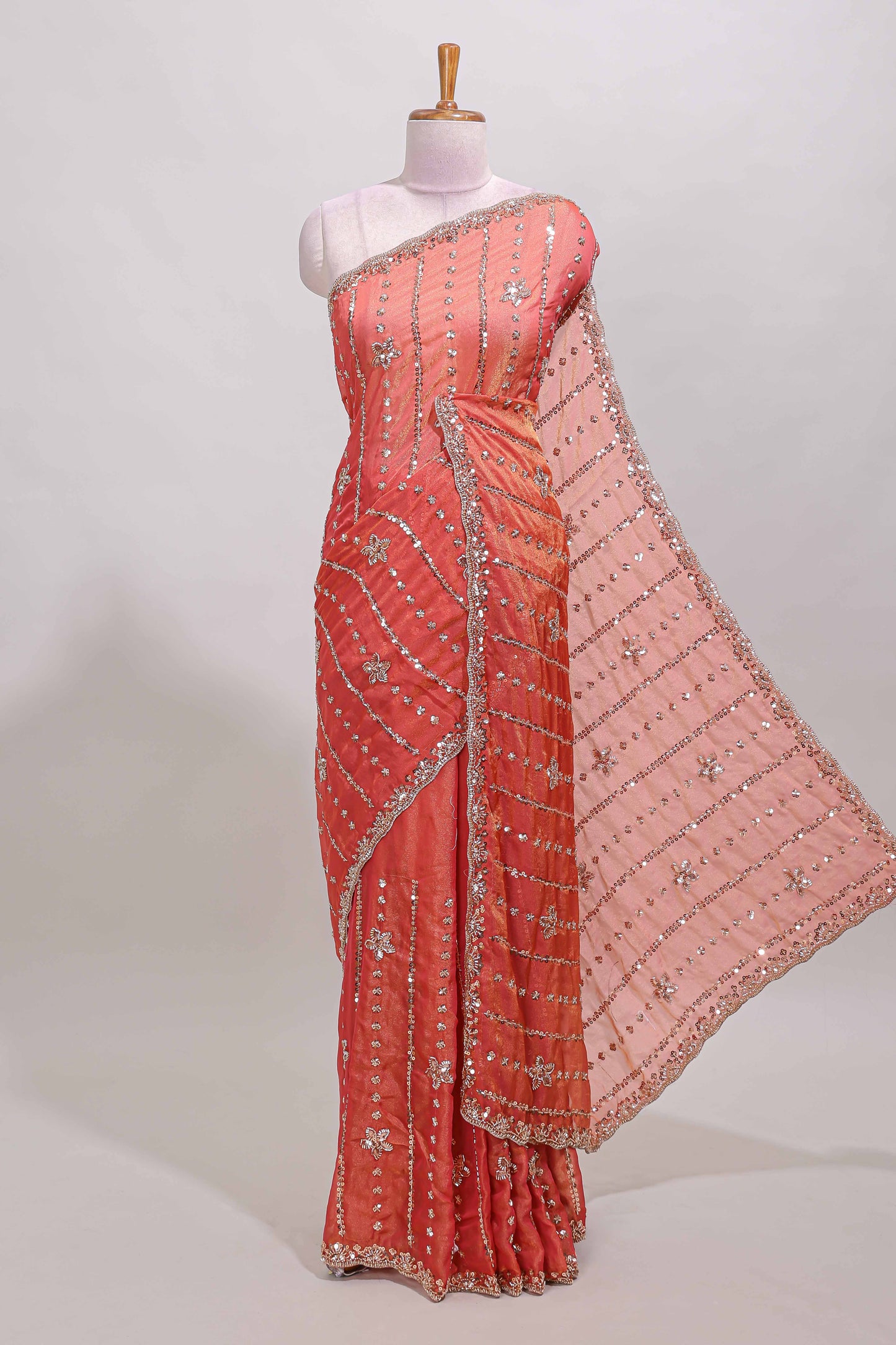 Peach floral design chamki work designer saree with self scallop border and matching blouse