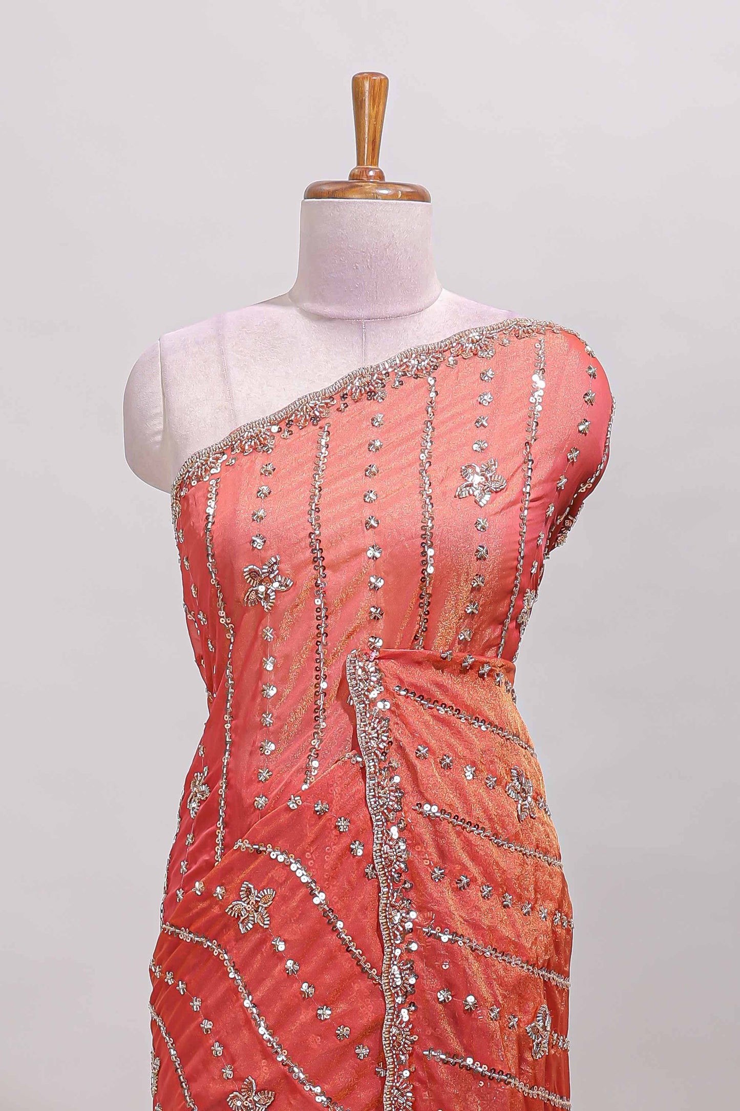 Peach floral design chamki work designer saree with self scallop border and matching blouse