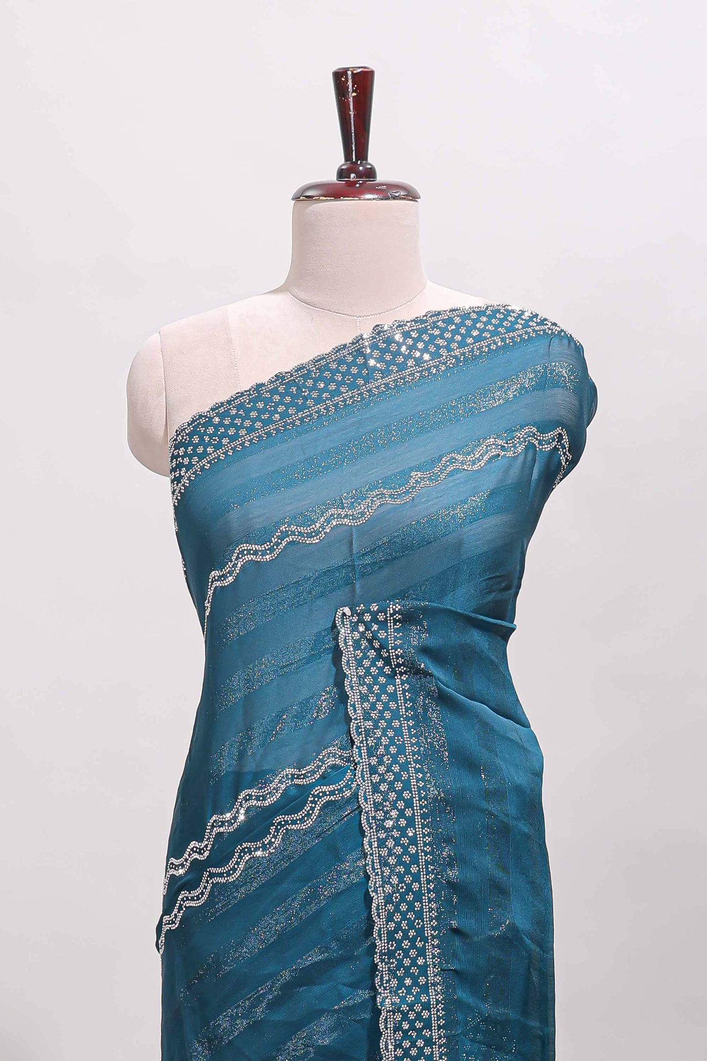 Forest green wave design stone work designer saree with self scallop border and matching blouse