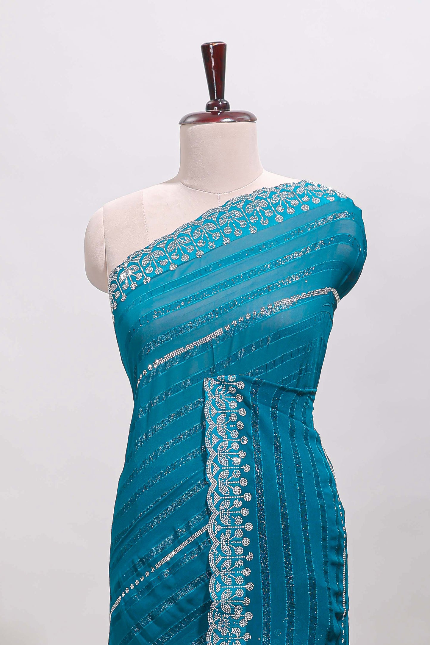 Bondi blue striped design stone work designer saree with self scallop border and matching blouse