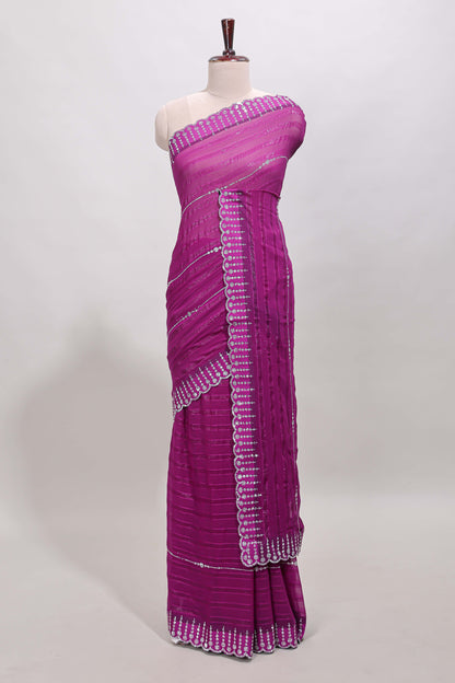 Dark magenta striped design stone work designer saree with self floral scallop border and matching blouse
