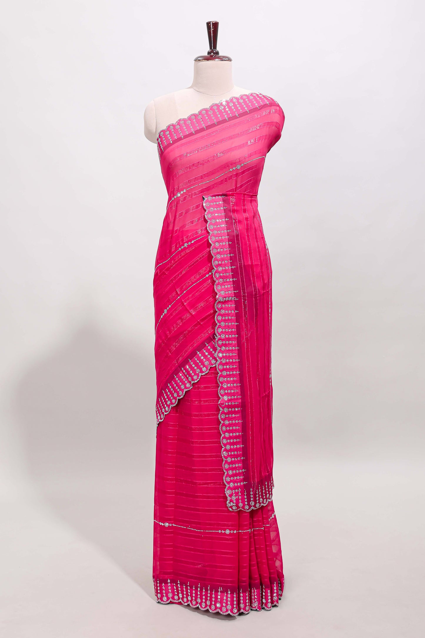 Pink striped design stone work designer saree with self floral scallop border and matching blouse