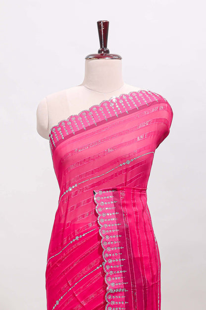Pink striped design stone work designer saree with self floral scallop border and matching blouse