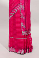 Pink striped design stone work designer saree with self floral scallop border and matching blouse