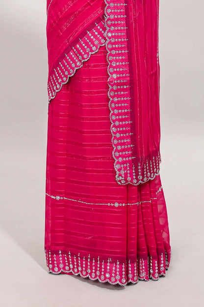 Pink striped design stone work designer saree with self floral scallop border and matching blouse
