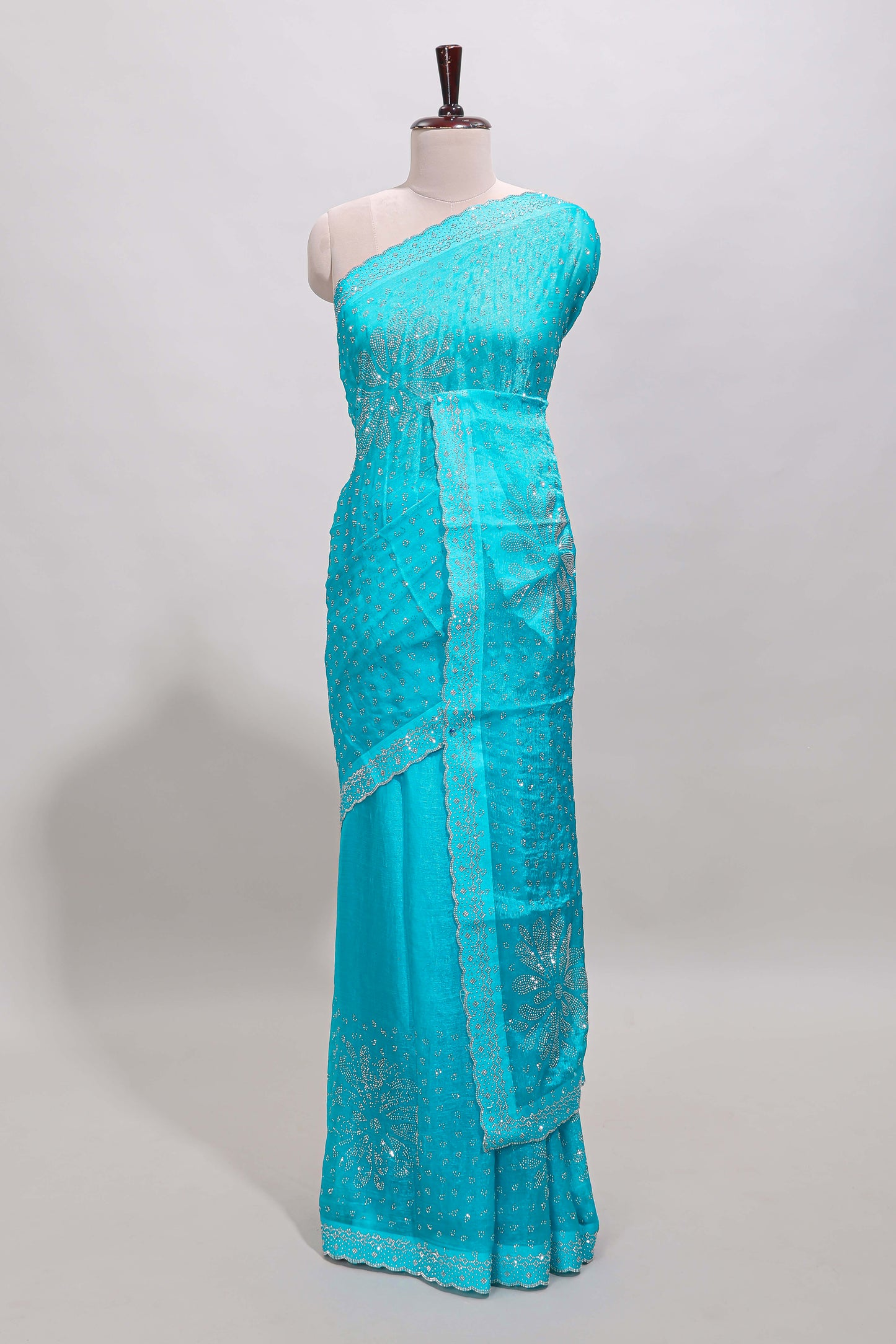 Turquiose blue floral motifs design stone work designer saree with self scallop border and matching blouse