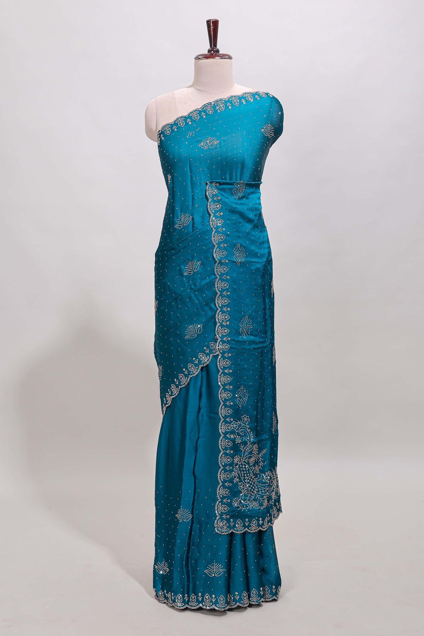 Midight green floral motifs design stone work designer saree with self floral scallop border and matching blouse