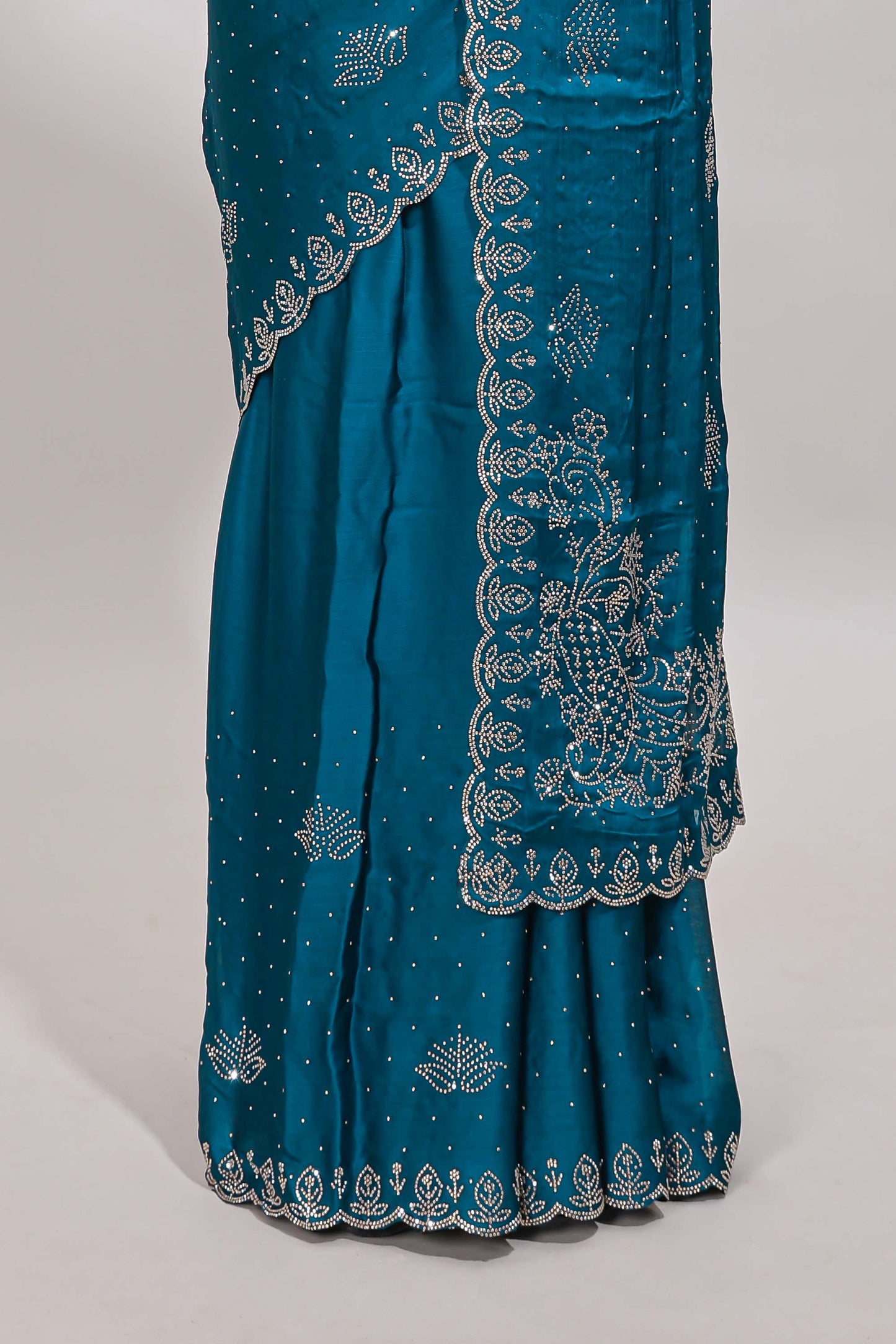 Midight green floral motifs design stone work designer saree with self floral scallop border and matching blouse