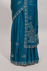 Midight green floral motifs design stone work designer saree with self floral scallop border and matching blouse