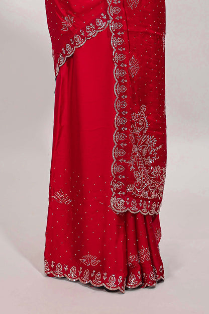 Rani pink floral motifs design stone work designer saree with self floral scallop border and matching blouse