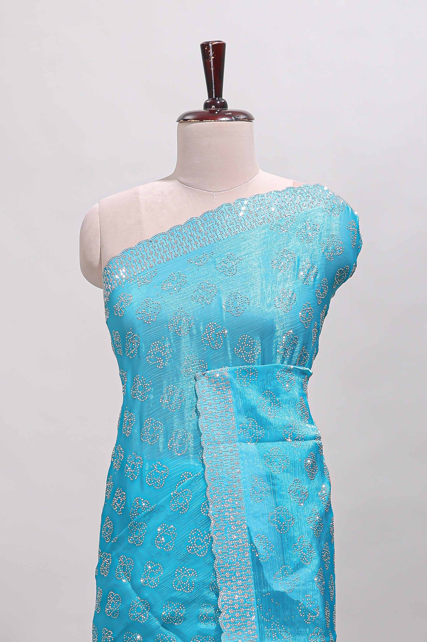 Turquiose blue floral butta design stone work designer saree with self scallop border and matching blouse