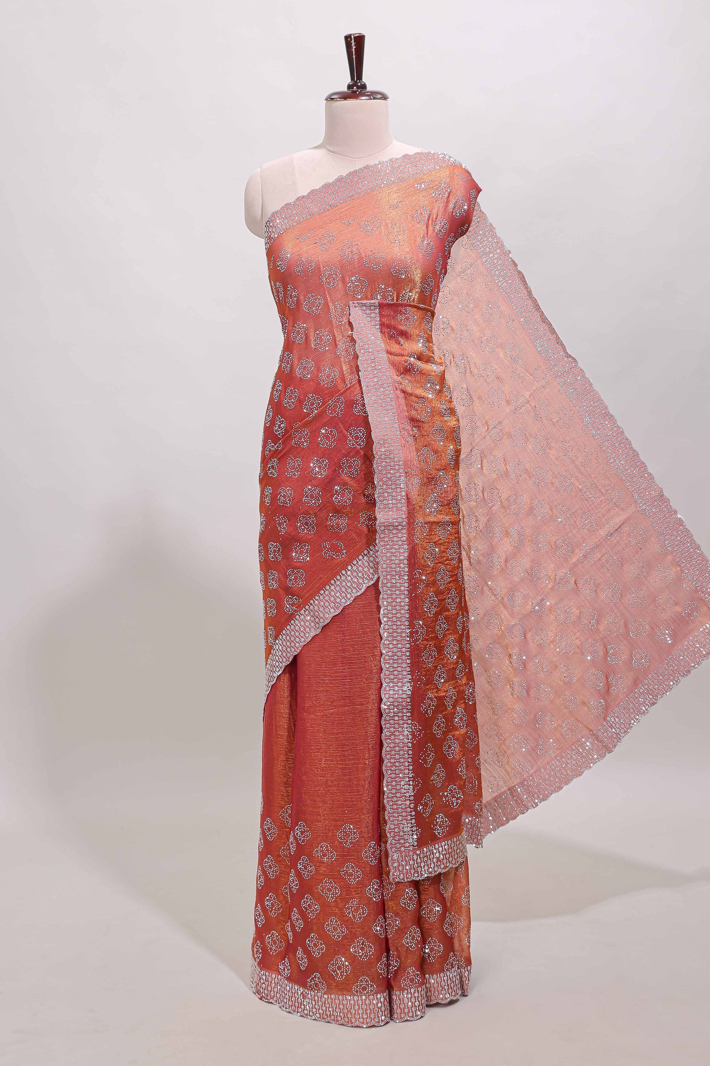 Orange floral butta design stone work designer saree with self scallop border and matching blouse