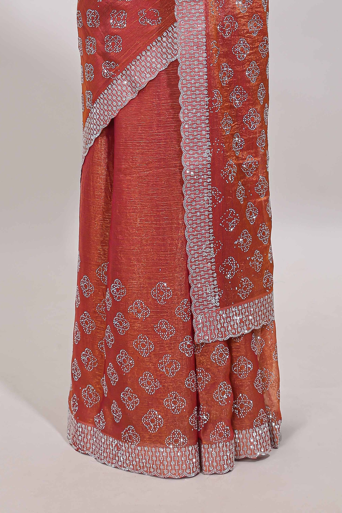 Orange floral butta design stone work designer saree with self scallop border and matching blouse
