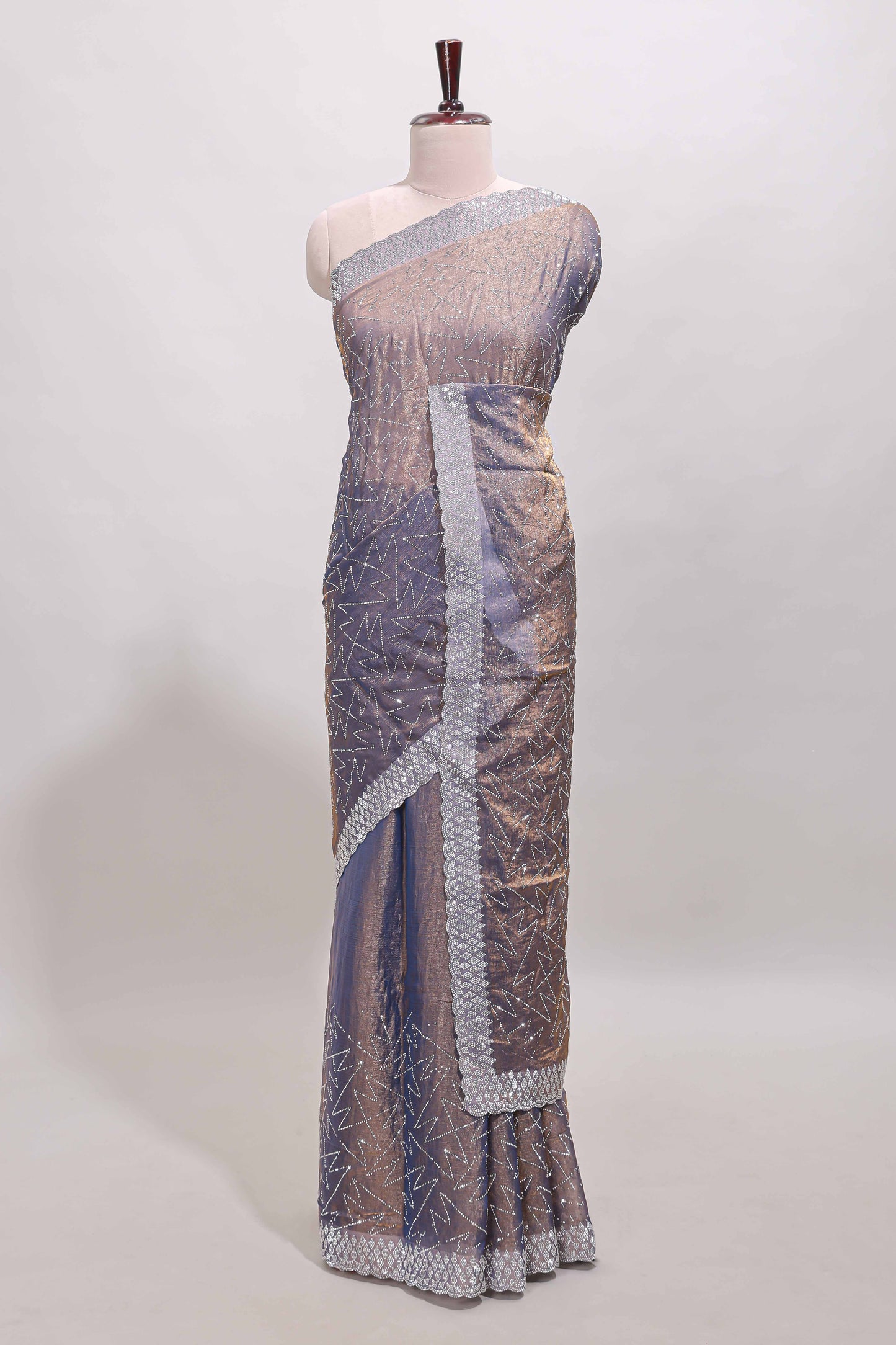 Grey geometric design stone work designer saree with self scallop border and matching blouse