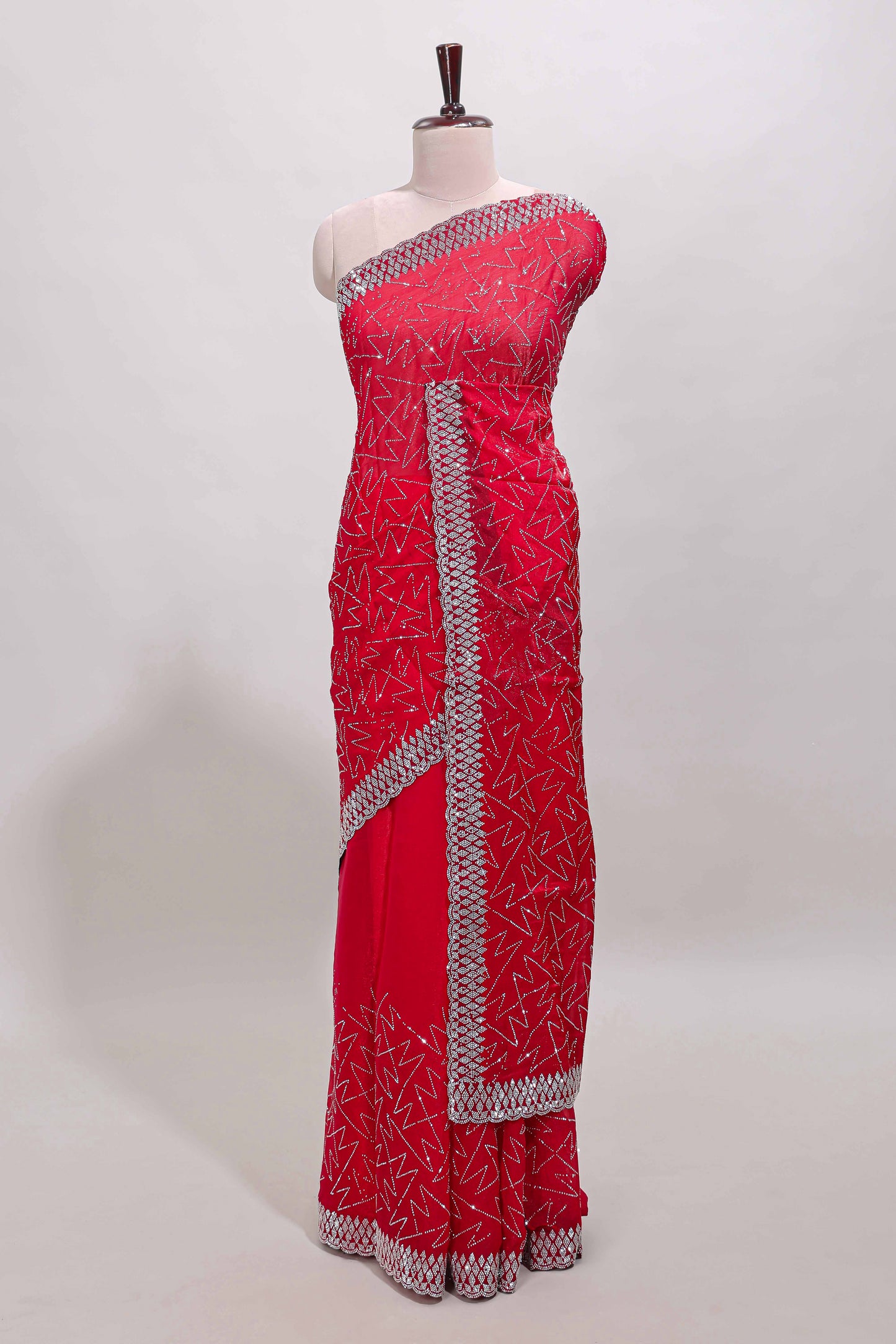 Pink geometric design stone work designer saree with self scallop border and matching blouse