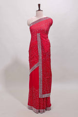 Pink geometric design stone work designer saree with self scallop border and matching blouse