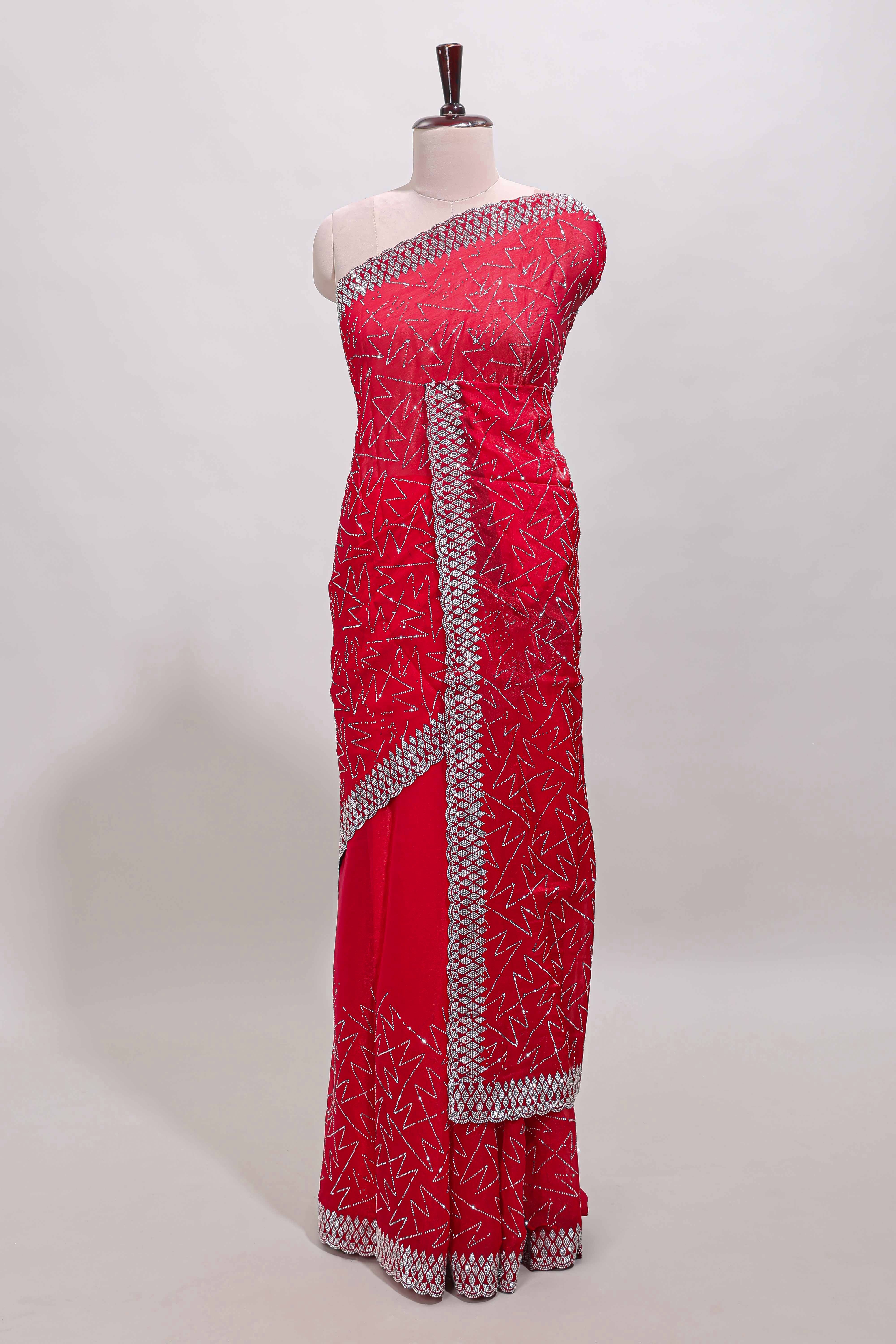 Pink geometric design stone work designer saree with self scallop border and matching blouse