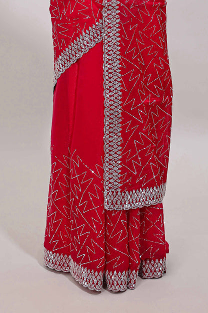 Pink geometric design stone work designer saree with self scallop border and matching blouse