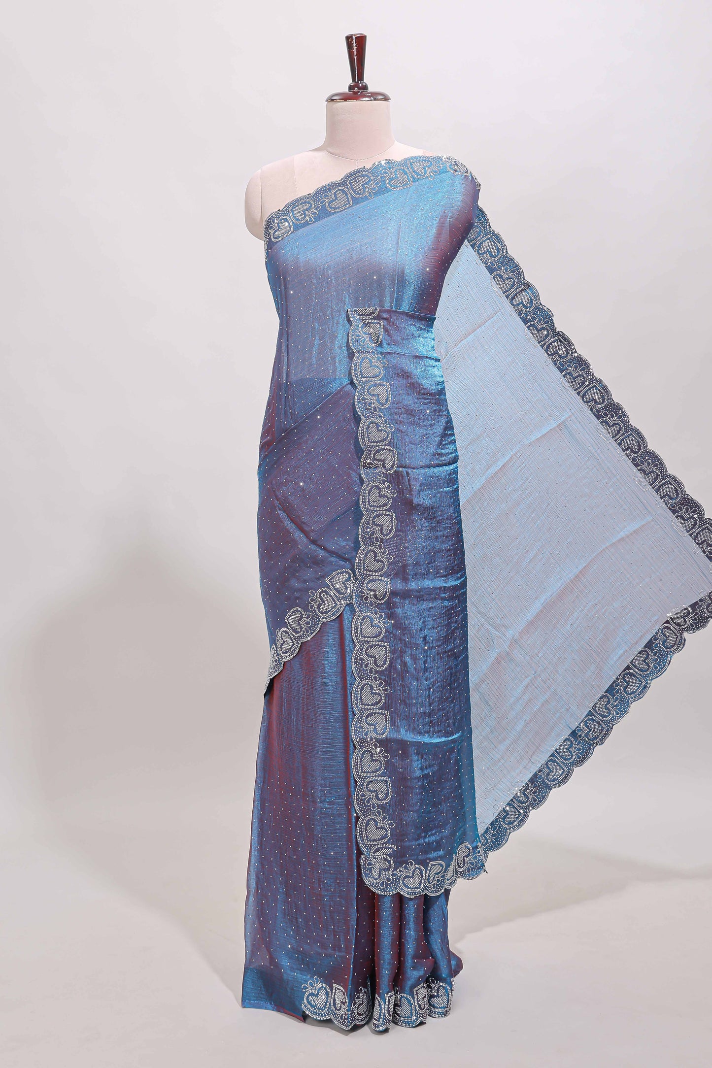 Blue stone work designer saree with self heartin design scallop border and matching blouse